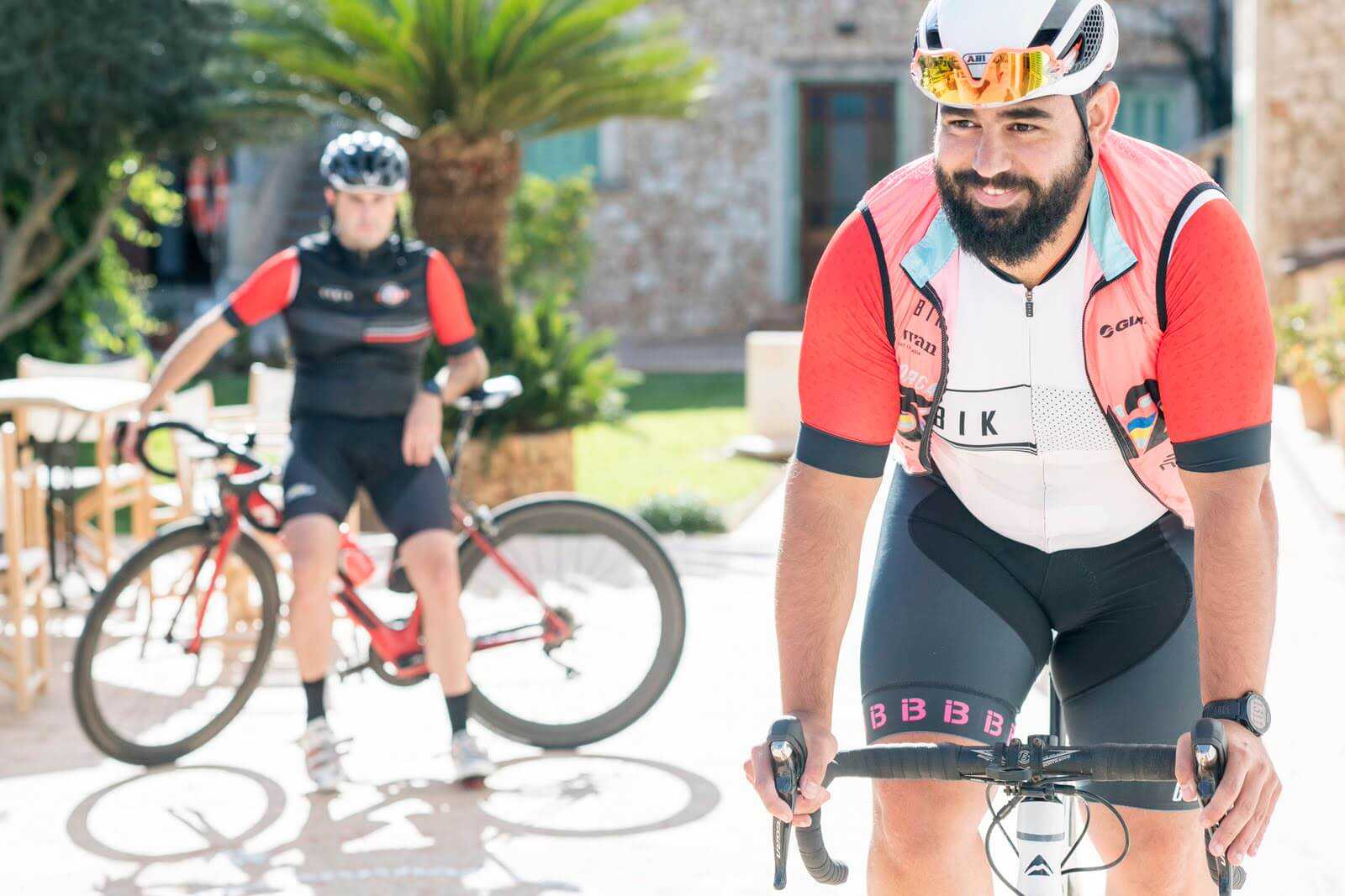 Cyclists getting ready in the garden