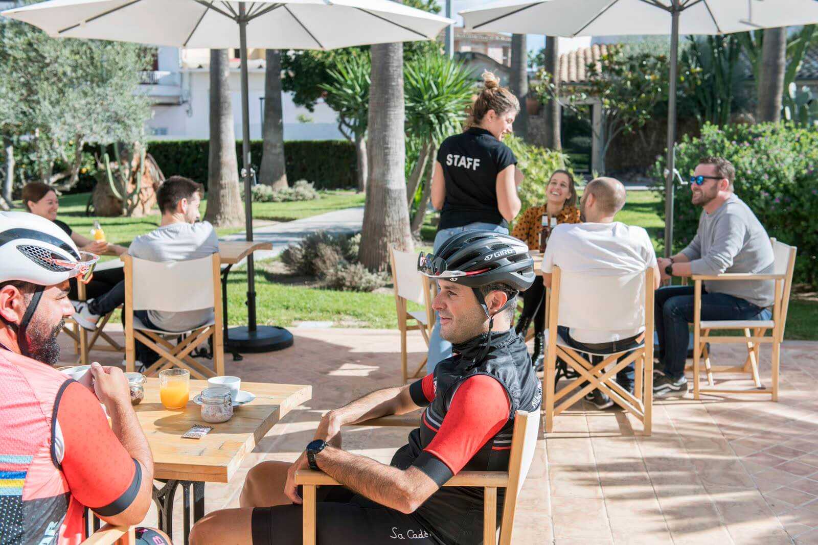 Cyclists getting ready in the garden