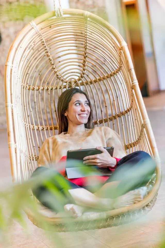 Reading in a hanging chair